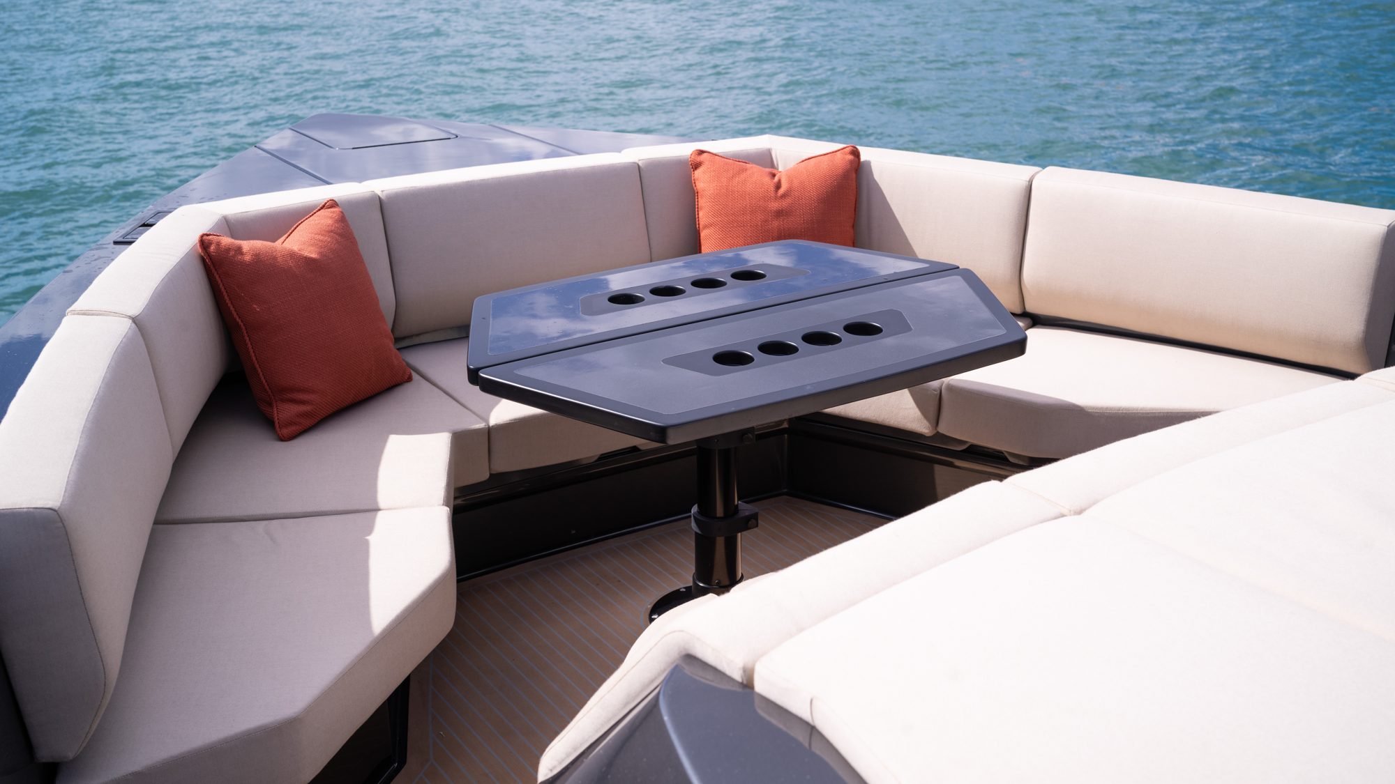 Italian wood dining table detail aboard the Manari 52